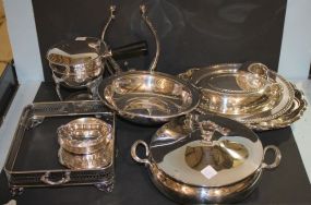Group of Silverplate casserole frame, trays, kettle frames, dish, and crumber.