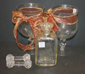 Two Large Glass Candleholders, Etched Bottle, 2 Knife Rest Two Large Glass Candleholders, Etched Bottle, 2 Knife Rest.