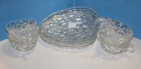 Four Glass Saucers and Cups Four Glass Saucers and Cups