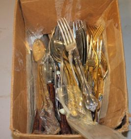Silverplate Flatware Silverplate forks, knife, three faux horn handled knives with stainless blades, five faux horn handled knives with Sheffield made in England Stainless blades two Silverplate forks marked nagel & meyer, four piece setting (mi