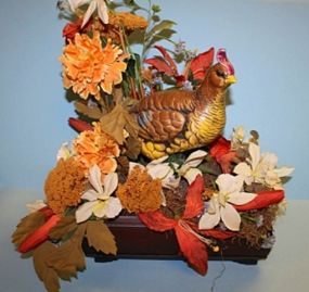 Decorative Floral Arrangement Featuring Ceramic Pheasant Description