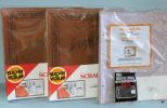 Two Scrapbooks and Pack of Scrapbook Paper Description