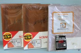 Two Scrapbooks and Pack of Scrapbook Paper Description