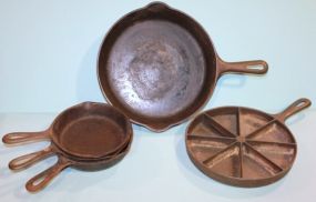 Large Griswold Handled Skillet and Four Other Cast Iron Pieces Description