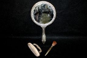 Silver Tone Hand Mirror, Nail Buffer and Makeup Brush Description