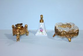 Crystal Ashtray in Gold Stand, Floral Design Perfume Bottle, Gold Tone Lighter with Cherub Base Description