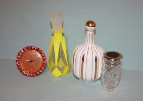 Three Glass Perfumes and a Cyma Watch Company Clock Description