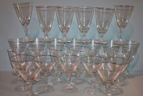 Twenty Six Piece Crystal Stems with Platinum Rim Description