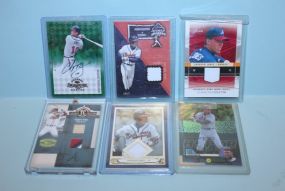 Six Baseball Player Cards in Plastic Cases Description