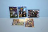 Five Football Player Cards in Plastic Cases, Brett Farve Description