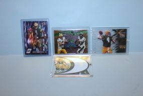 Four Football Player Cards in Plastic Cases, Brett Farve Description