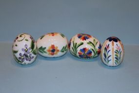 Four Hand-Painted Gail Pittman Eggs Description