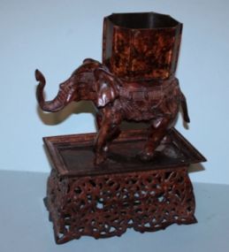 Ornate Metal Elephant Floral Metal Stand, Faux Bronze Color Description
