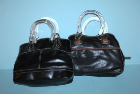 Two Black Horseshoe Handled Purses Description