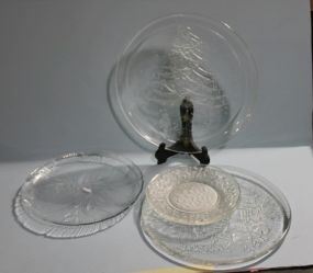 Three Christmas Serving Plates and Two Etched Christmas Plates Description