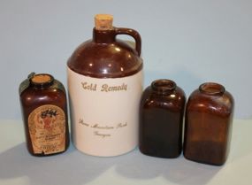Three Brown Snuff Bottles and a Souvenir Whiskey Jug Description