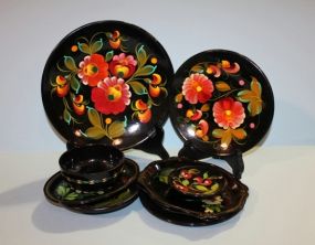 Set of Black Dishes and Bowls with Floral Design Description