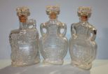 Three Glass Decanters Description