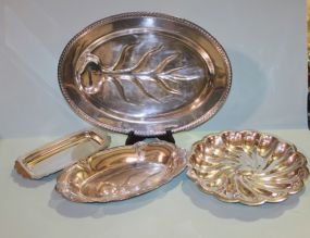 Group of Four Silverplate Trays Description