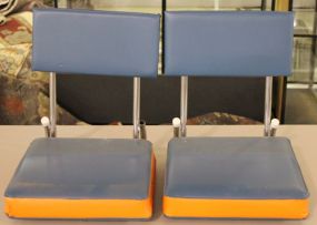 Two Blue and Orange Stadium Seats Description