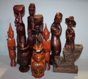 Group of Ten Decorative Wooden Figurines From Haiti Description