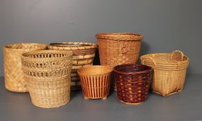 Group of Eight Baskets and Waste Cans Description
