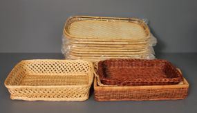 Group of Four Bread Baskets and Fourteen Basket Trays Description