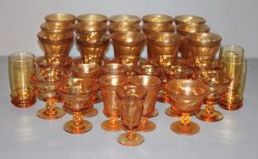 Group of Thirty Four Amber Colored Glasses Description