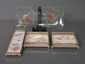 Three Ceramic Trays and One Clear Glass Tray Description