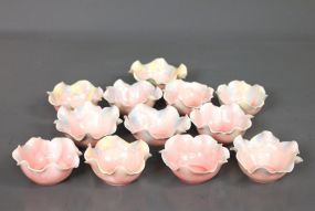 Set of Twelve Flower Shaped Nut or Candy Dishes Description