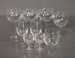 Group of Nine Various Sized Clear Wine and Brandy Glasses Description