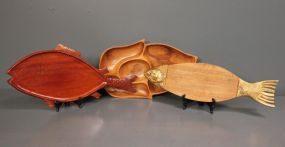 Three Wooden Serving Trays and Brass Serving Piece Description