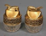 Pair of Table Lighters with Gold Colored Tops Description