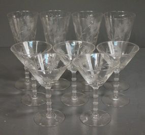 Set of Four Champagne Glasses and Five Martini Glasses Description