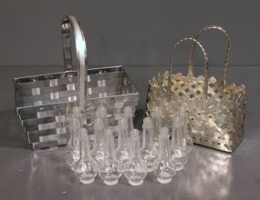 Two Metal Woven Baskets with Fourteen Clear Glass Perfumes Description