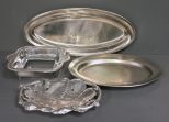 Group of Four Serving Trays Description