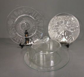 Glass Cake Dome and Three Glass Under plates Description