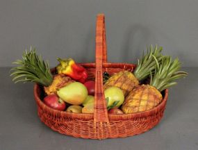 Woven Basket with Rubber Fruit Decorations Description