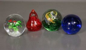 Four Art Glass Paperweights Description