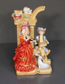 Dresden Figurine of Lady and Gent Playing Musical Instruments Description