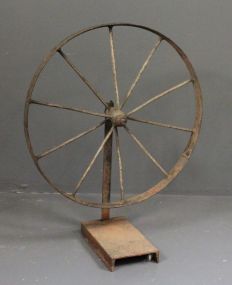 Iron Wheel on Stand Description
