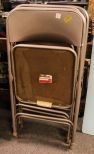 Four Samsonite Folding Chairs