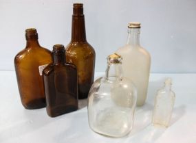 Six Various Size Bottles