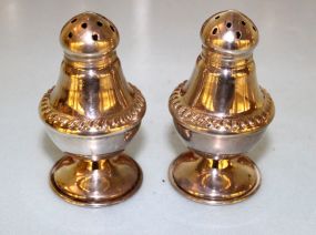 Two Sets of Sterling Shakers