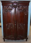 Elaborately Carved Armoire