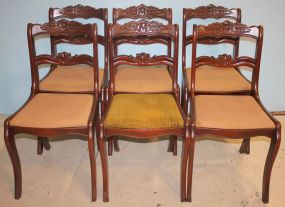 Six Mahogany Rose Caved Chairs