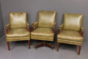 Three Vintage Leather Arm Chairs