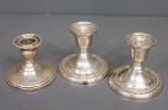 Three Sterling Weighted Candlesticks
