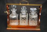Mahogany Tantalus with Cut Glass Decanters, Sterling Tags