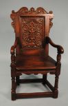 20th Century Oak Carved Back and Crest Arm Chair